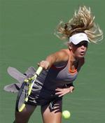 Caroline Wozniacki vandt første sæt, men gik så ned i de to næste 