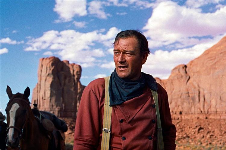 Hollywoods klassiske machofigur - her i skikkelse af John Wayne - er yt i det 21. århundrede. 