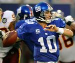 New York Giants quarterback Eli Manning gør klar til kast. 