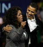 Den amerikanske underholdningsindustri er kendt for at være demokraternes faste støtter. Oprah Winfrey og Barack Obama i december 2007. Arkivfoto. 
