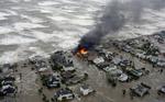 En brand i et hus på stranden i Galveston Island, Texas. Vandet skyller allerede ind over området, Ike nærmer sig, og eksperter advarer om mere end syv meter høje flodbølger. En regulær katastrofer truer, siger chef for Ministeriet for National Sikkerhed. 