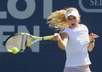 Caroline Wozniacki tabte med sin dobbeltmakker efter en lyntiebreak. 