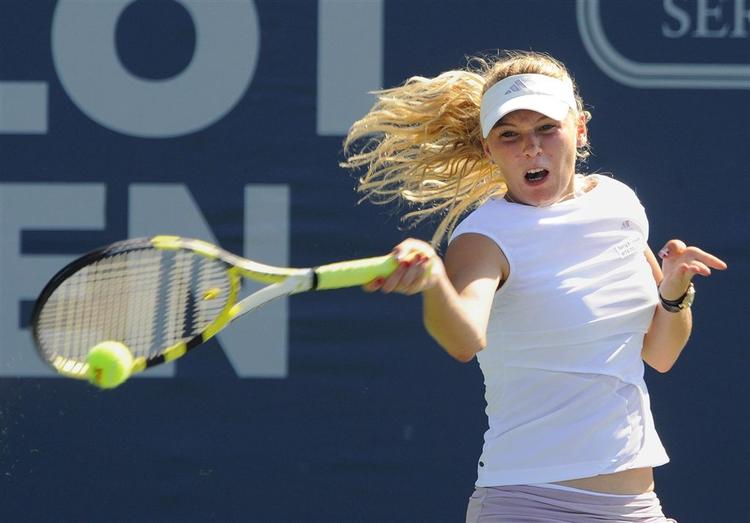 Caroline Wozniacki tabte med sin dobbeltmakker efter en lyntiebreak. 
