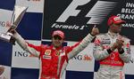 Felipa Massa (tv.) kom ind som nummer to ved Belgiens grand prix, men en protest gav ham sejren. 