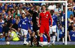 Liverpools spanske stjerne, Fernando Torres, jubler efter et af de to mål, angriberen i dag scorede mod rivalerne mod Everton. 