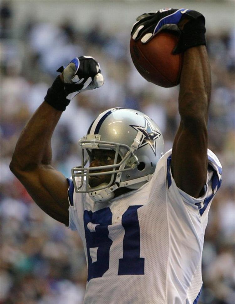Dallas Cowboys' stjernereciever Terell Owens jubler efter en scoring. Men det var ikke nok til sejr mod rivalerne fra Redskins. 