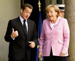 Nicolas Sarkozy og Tysklands Angela Merkel i Paris for at deltage i topmødet. 