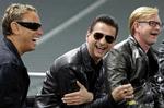 Sort-hvid. Depeche Mode forsøger på sit nye album at forene teksternes mørke med lysere toner. Foto: AP 