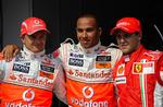 Heikki Kovalainen, Lewis Hamilton og Felipe Massa på podiet efter et løb i Ungarn i august. 