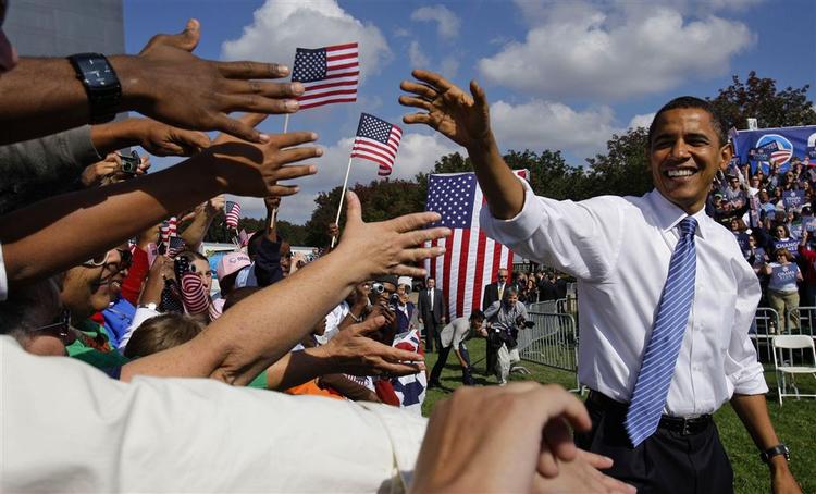 Barack Obama hilses velkommen af jublende tilhængere i St. Louis, Missouri. 