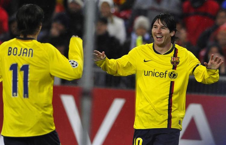 Lionel Messi (tv.) lavede de første, 18-årige Bojan Krkic to af de andre, da FC Barcelona udspillede FC Basel. 