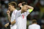 Jon Dahl Tomasson og resten af landsholdet ligger på førstepladsen i Danmarks VM-kvalifikationspulje. Til gengæld har årets økonomiske resultat ikke været noget at prale af. 