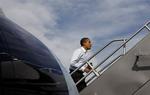 Obama på vej ombord på flyet i Las Vegas. 