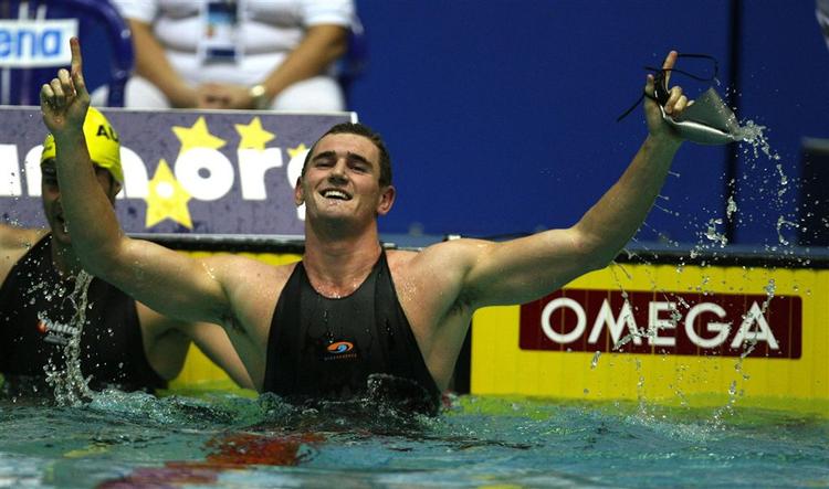 Cameron Van Der Burgh jubler efter sin verdensrekord i 100 meer brystsvømning på 56,88 sek. 
