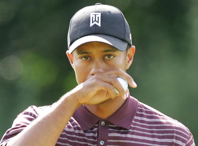 Tiger Woods har tjent styrtend emed penge på aftalen med GM. 