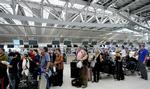 Stranded travellers in the departure lounge at Suvarnabhumi international airport in Thailand. 
