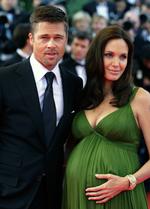 Her ses skuespillerinden Angelina Jolie med sin mand og kollega Brad Pitt. Arkivfoto. 