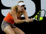 På det olympiske tennisanlæg i Sydney vandt Caroline Wozniacki 6-1, 6-2 over slovakken Dominika Cibulkova. Arkivfoto. 
