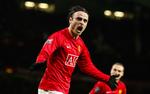 Dimitar Berbatov jubler efter at have scoret kampens tredje mål. 