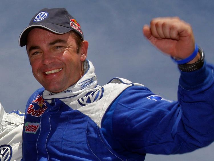 Sydafrikas Giniel de Villiers, som kører for VW, fejrer sin sejr i Dakar Rally. 