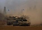Israelske tanks på vej hjem fra Gaza søndag. 