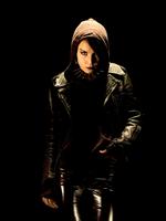 Lisbeth Salander spilles af Noomi Rapace. 