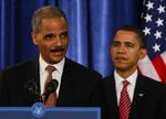 Eric Holder (tv.) er USA's nye justitsminister (arkivfoto). 