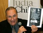 Efraim Zuroff, director of the Jewish Simon Wiesenthal Center, holding up a reward sign during a press conference in Santiago in July 2008. Representatives of the Jewish human rights organization arrived in Chile in a renewed hunt for former SS doctor Aribert Heim. . 