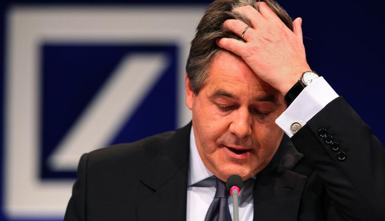 Deutsche Banks bestyrelsesformand, Josef Ackermann, præsenterer et gigantisk underskud. 