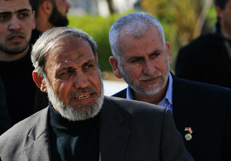Hamaslederen Mahmoud Zahar (tv.) er taget til Egypten (arkivfoto). 