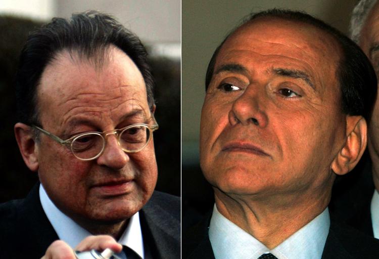 Den britiske advokat David Mills (tv.) modtog penge fra en Berlusconi-fond for ikke at røbe hemmeligheder om den italienske premierministers ledelse. 