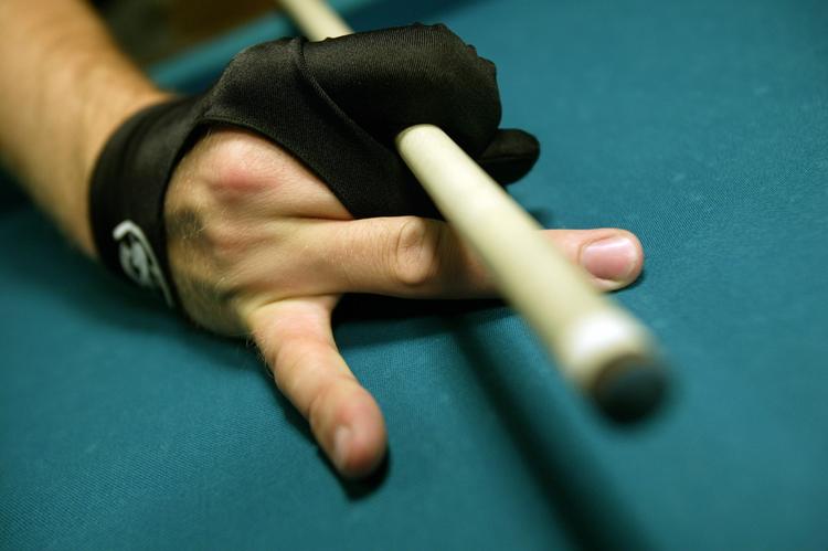 Det kræver langvarig koncentration at spille billard. Arkivfoto. 