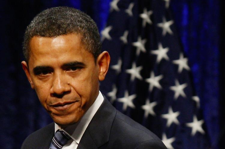 Barack Obama er vred på forsikringsgiganten AIG (arkivfoto). 