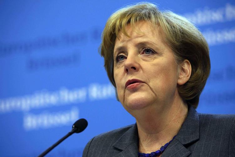 German Chancellor Angela Merkel and Foreign Minister Frank-Walter Steinmeier seem to differ in attitudes to Barack Obama's administration. Archive photo. 