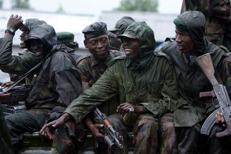 En gruppe oprørssoldater i DR Congo fotograferet i januar. Flere børn er blevet befriet fra oprørsgrupper, er brugte dem som børnesoldater. Det vides ikke, om disse soldater er blandt de skyldige. 