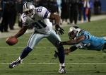 Terrell Owens (tv.) har ikke stoppet karrieren, men det bliver ikke i Dallas Cowboys, at den kontroversielle wide reciever fortsætter. Arkivfoto. 