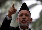 Afghanistans præsident, Hamid Karzai, har svært ved at få Taleban i tale. Arkivfoto 