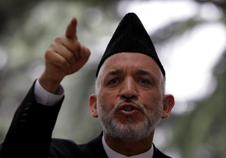 Afghanistans præsident, Hamid Karzai, har svært ved at få Taleban i tale. Arkivfoto 