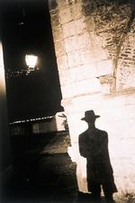 Shadow of man wearing a hat. Old San Juan, Puerto Rico.