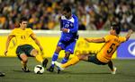 Australien (gule trøjer) i kamp mod Kuwait i kvalifikationskamp i Canberra 5. marts. Arkivfoto. 