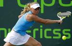 Caroline Wozniacki kom igen ud i en længere kamp med Jelena Dokic, men danskeren var stærkest i afslutningen af opgøret. 