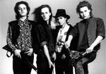 Fire unge rockmusikere i et band, der hed Disneyland After Dark, her fotograferet i 1985. I år fejrer de 'sølvbryllup' som sceneorkester. 