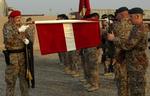 En flagdag skal være til ære for de danske soldater, som har deltaget i internationale operationer. Her indgår flaget i en ceremoni mellem danske og irakiske soldater i Irak i 2007. 