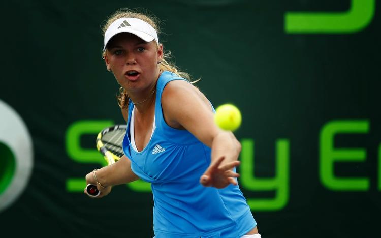 Carolina Wozniacki er skuffet over, at hun gik ned i tredje sæt mod russeren Svetlana Kuznetsova. Arkivfoto. 