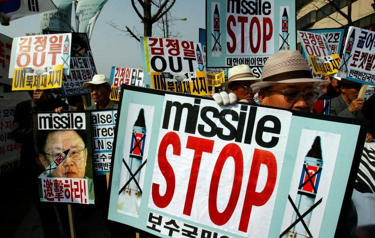 Demonstranter i Sydkorea protesterede i weekenden om Nordkoreas raketaffyring. Arkivfoto. 