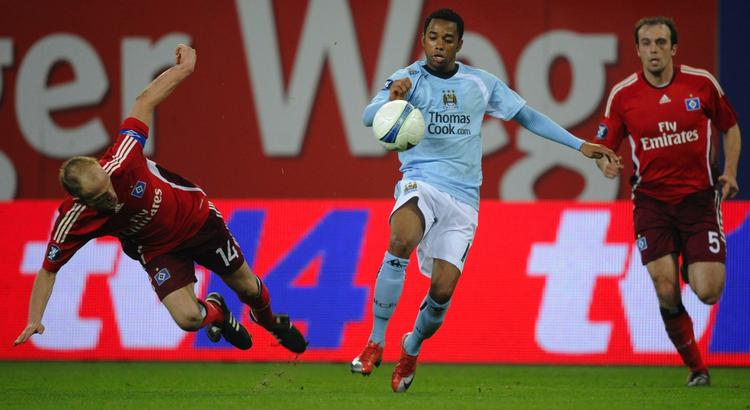 Robinho (i midten) lagde op til Citys 1-0-mål. 
