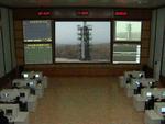 Affyringen af den nordkoreanske raket har fået FN's fordømmelse. Fotoet her fra det statslige tv viser kontrolrummet i Nordkorea, kørt før affyringen af raketten. 