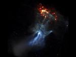 Inde midt i dette fantastiske billede - usynlig for øjet - ligger en lille pulsar, som med sin enorme energi har skabt et gigantisk rum-lysshow omkring sig. 
