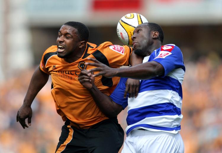 Wolverhampton Wanderers' Sylvan Ebanks-Blake (tv) var med til at sikre sit hold oprykning til Premier League, da de i dag slog Queens Park Rangers. 