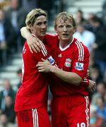 Fernando Torres (tv.) havde grund til at lykønske Dirk Kuyt. Hollænderen scorede to gange mod Hull 